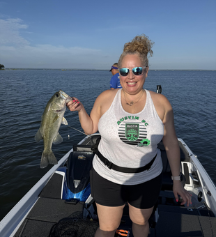 Smallmouth Bass on the line at Buchanan Dam under partly cloudy skies!