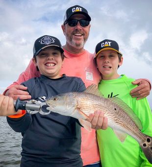 Family Fishing in Mosquito Lagoon, FL