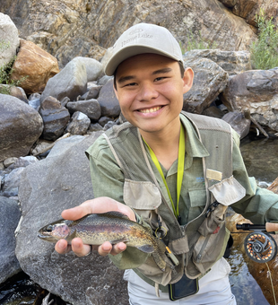 Nice cutthroat trout on the fly! Perfect day on Forest Road.