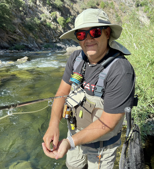 Great fly fishing conditions with partly cloudy skies - perfect for an adventure on the water!