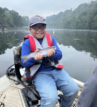Nice rainbow trout using jigging and heavy tackle on this partly cloudy day!