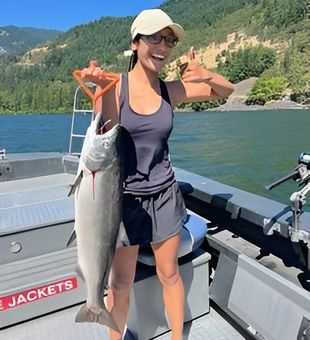 Smiling Chinook salmon catch
