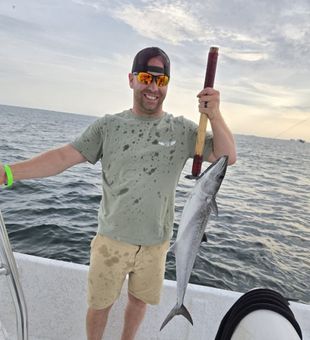 Ocean breeze, sandy feet, and rods in hand.