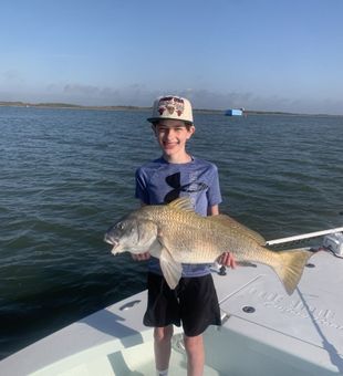 Redfish by this young angler - Corpus Christi, TX.