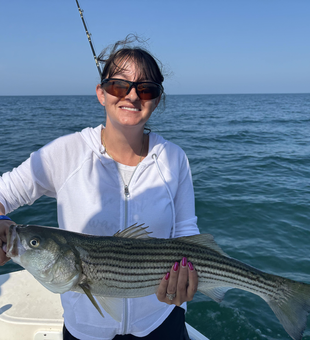 Barnstable Harbor's striped bass challenge: deep sea jigging and trolling under clear skies!