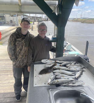 Caught the catch of the day on the dock.