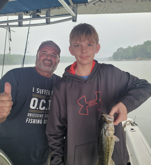Beautiful Lake Norman spotted bass hauled in!