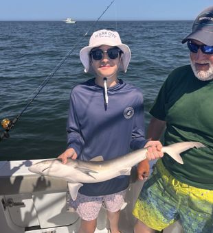 Chasing action in the shallow waters of Rehoboth Beach—Delaware inshore fishing at its finest.