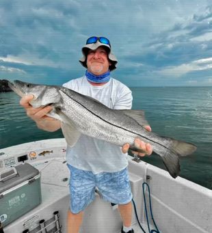 Bobby with a beautiful Top Slot Snook!  