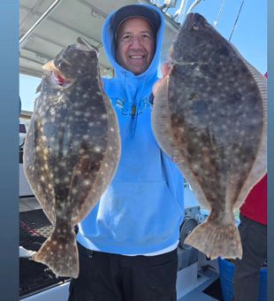 Nice pair of NYC summer flounder hitting the deck!