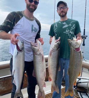 Lake Michigan fishing action, catching Chinook and Coho salmon.