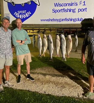 Salmon landed on a sunny day in Lake Michigan.