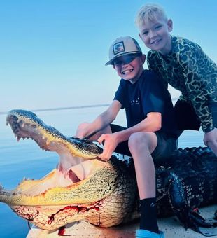 Trophy gator landed during an unforgettable alligator hunt in Crescent City—a true Florida backcountry hunting adventure.