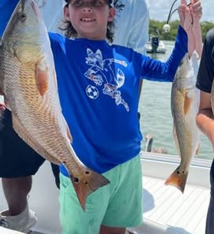 Big smiles and great catches make kids-friendly fishing in Bonita Springs, FL a family memory worth making.