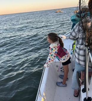 Young Girl excited to get some oysters  - Biloxi, MS.