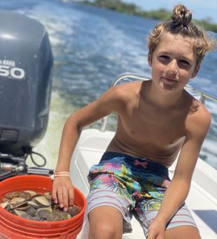 The water was crystal clear in Homosassa, FL, perfect for scalloping adventures and carefree family swims.