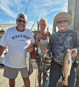 Great redfish action using jigging and trolling techniques!