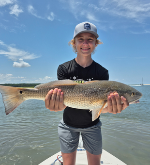 Big redfish landed on a partly cloudy day in Hilton Head!