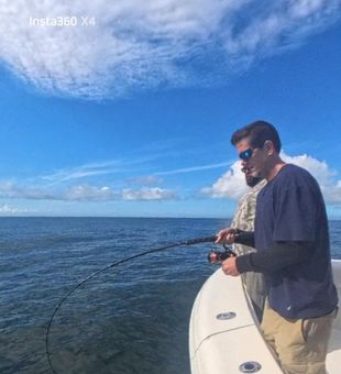 Hooked up and working the line in calm Virginia Beach waters!