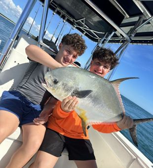 Great offshore haul with king mackerel and shark on deck!