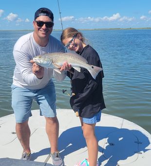 Smiles and redfish! 🎣