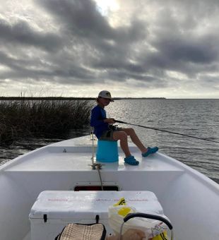 Young angler enjoying Apalachicola Bay family fishing trip