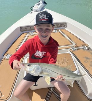Young Angler and his snook - Fort Myers Beach, FL.