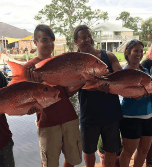 Great friends with their huge fish