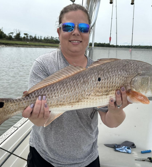 Target locked: Redfish on the line!