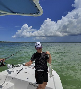 Cloudy skies and rain can't dampen the excitement of fishing in Marco Island!