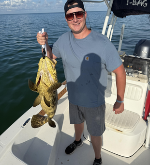 Jigging and surf casting under clear skies - Marco Island's best fishing awaits!