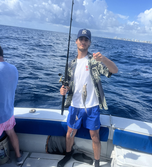 Braving the storm for a thrilling deep sea fishing adventure at Riviera Beach!