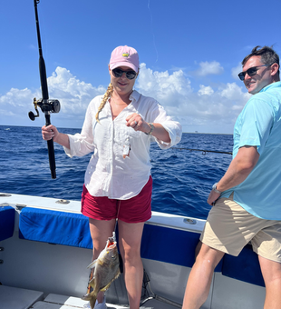 A feisty white grunt caught during an epic deep sea fishing adventure in West Palm Beach, FL!