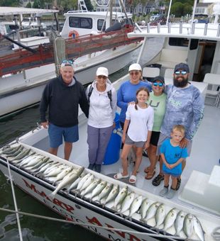 Loaded bluefish day with a happy crew.