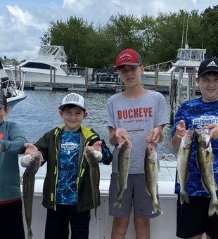 Lake Erie fishing charter 🎣 Kids showing off a big walleye haul!