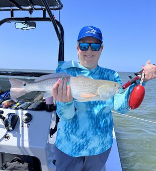 Redfish delight, South Padre Island fun.