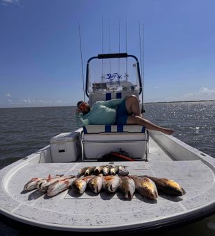 Big redfish haul and laid-back vibes.