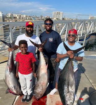 This Bluefin Tuna is big as this kid