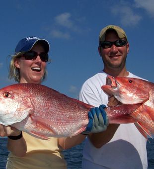 Today’s best catch — and the smiles to prove it.