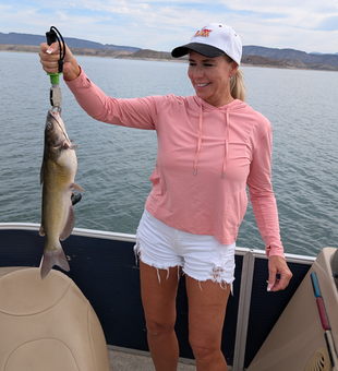 Nice brown bullhead using jigging and trolling techniques in partly cloudy conditions!