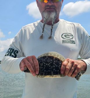 Proud flounder catch on the bay!
