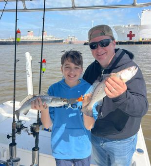 Awesome father-son speckled trout duo!
