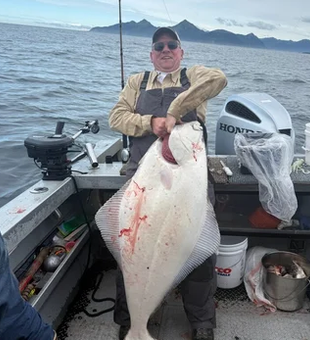 Giant Alaska halibut on a private fishing charter