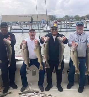 Landing trophy walleye on the waters of Ludington, Michigan—prime Great Lakes fishing at its finest.