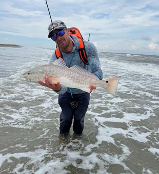 Impressive Redfish caught surf fishing Mississippi