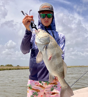 Matagorda wade fishing for trophy trout and Redfish with expert guidance.