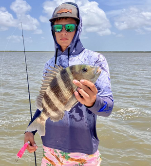 Working with one of the best fishing guides in Matagorda Bay area for Redfish and Sheepshead.