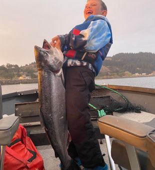 Joyful catch: giant Chinook Salmon!