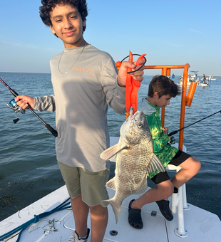 Reeling in a 15-inch Black Drum off South Padre Island!