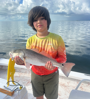 Nice redfish caught using deep sea jigging and light tackle at South Padre Island!